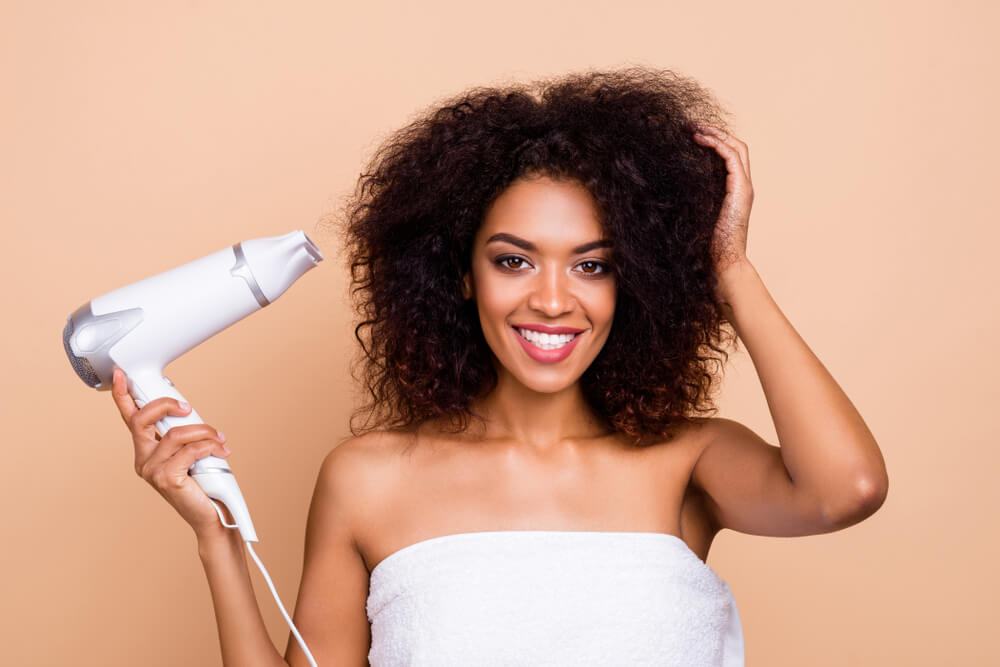 Blow drying curly hair